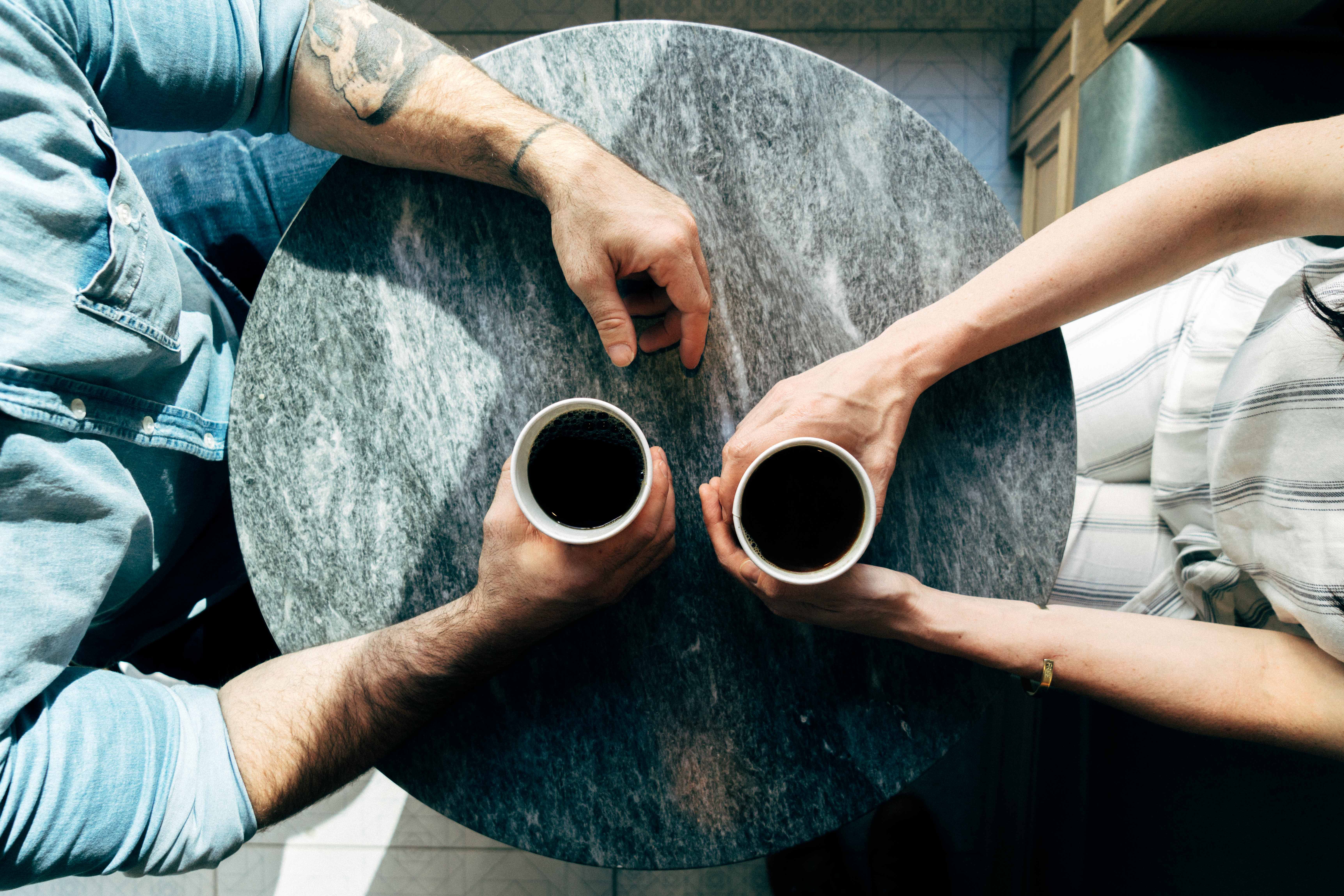 a couple having coffee and talking